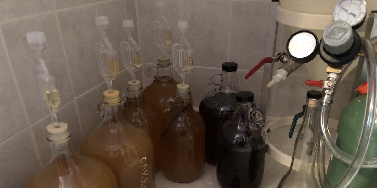 Six gallons of mead aging