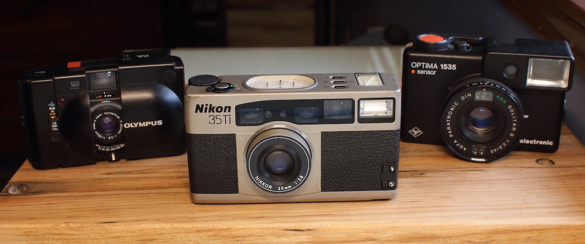 Nikon 35Ti compared to an Agfa Optima 1535 and an Olympus XA (front)