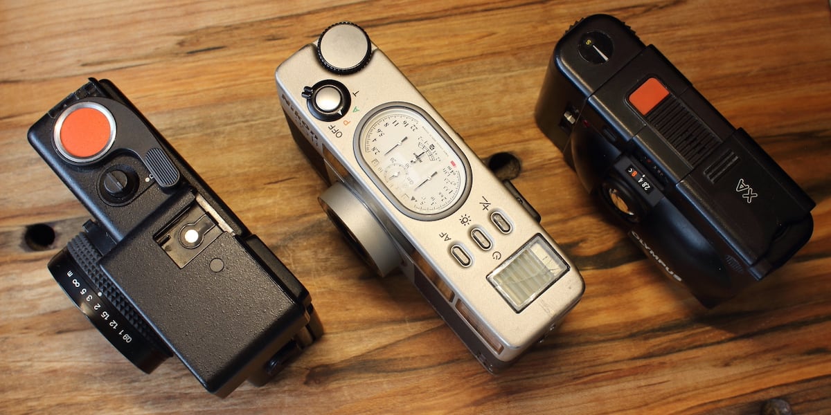 Nikon 35Ti compared to an Agfa Optima 1535 and an Olympus XA (top)