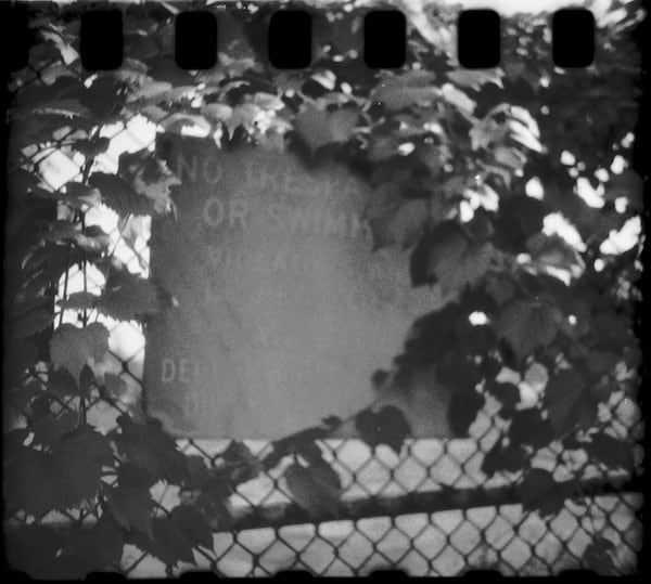 [Overexposed] Sign near Old boat garage at Summit Lake