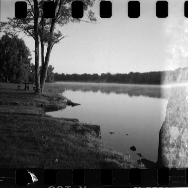 Photographing sunrise over Silver Creek Lake (partial double exposure)