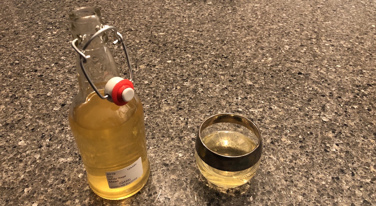 Enjoying a delightful dry mead made with white sage honey
